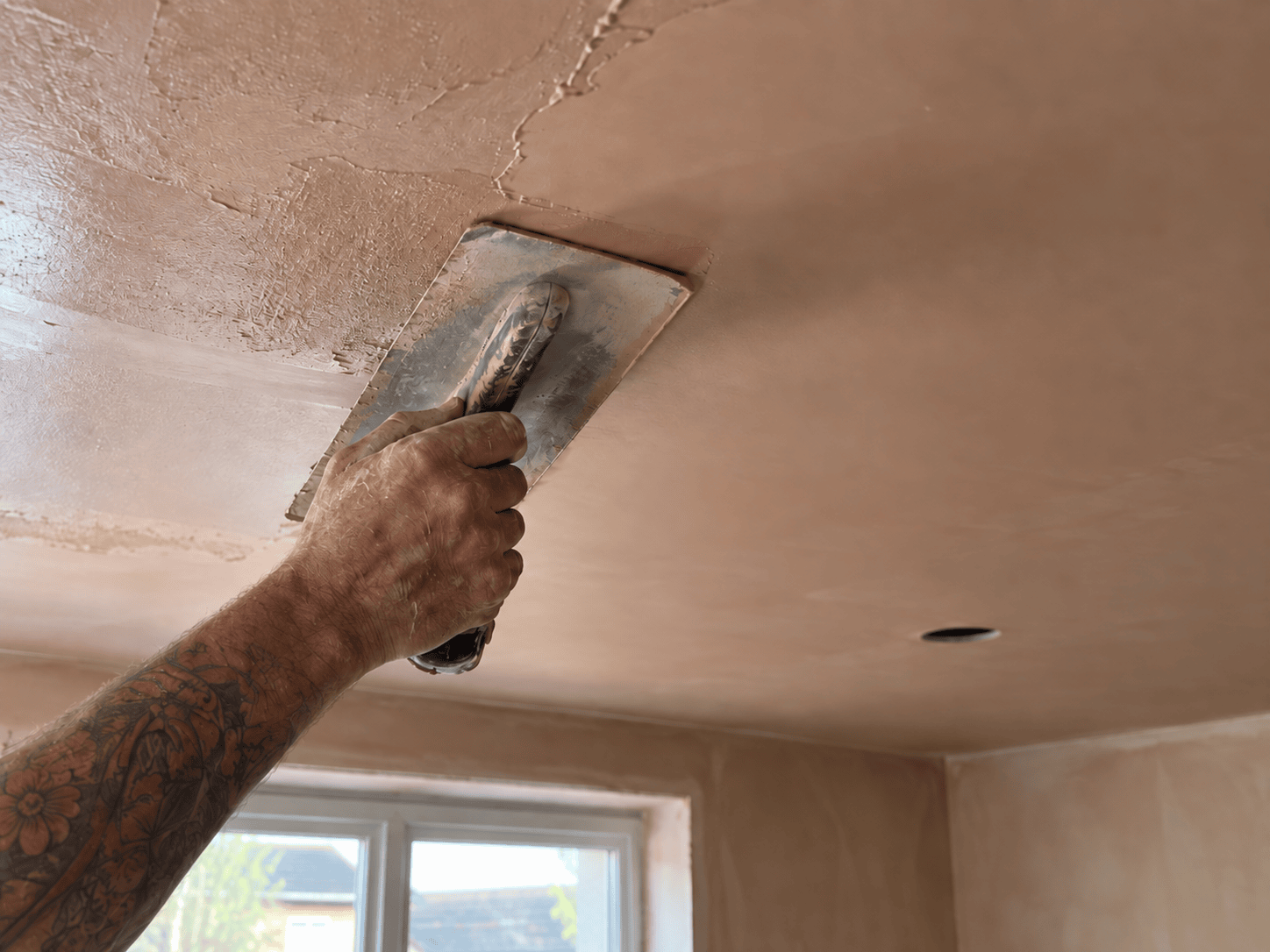 Freshly plastered flat ceiling